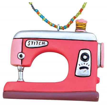 Red and pink sewing machine ornament.