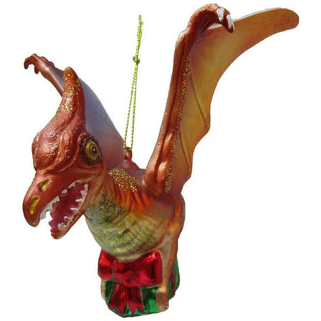 Orange flying dinosaur with a green & red gift in its talons.