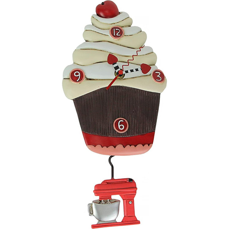 Wall clock shaped like a chocolate cupcake with vanilla icing and a cherry on top. The Pendulum is a red electric stand mixer.