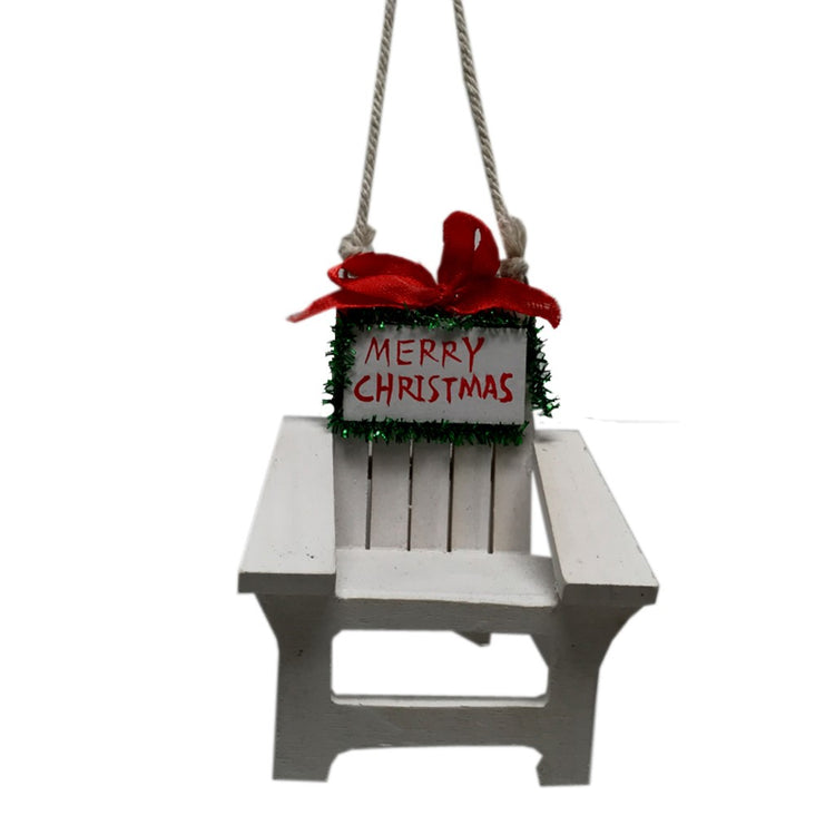 Christmas ornament shaped like an adirondak chair. White with red ribbon and text "Merry Christmas".