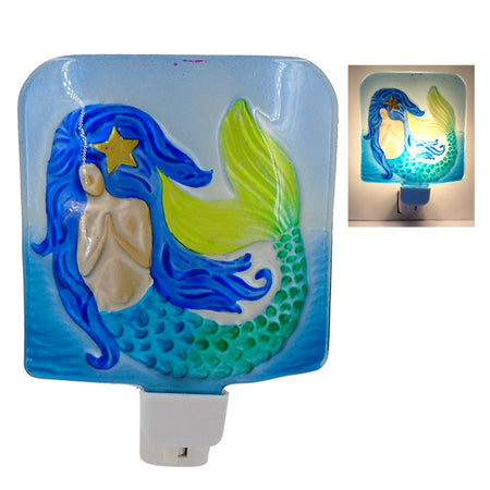 Square shaped night light in blues with mermaid picture.