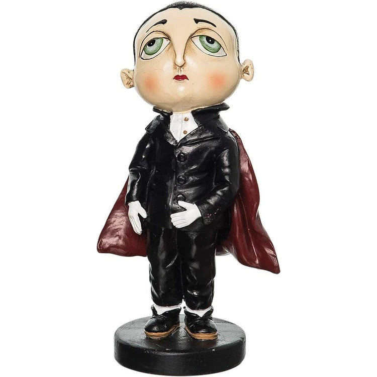 Resin Hand painted figurine of a vampire in an all black suit and a red cape.