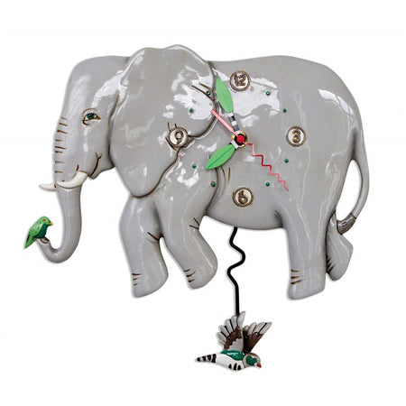 Elephant shaped wall clock with bird pendulum.