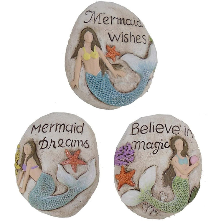 3 different mermaid stones that say 'mermaid wishes, believe in magic, mermaid dreams'. Multi-colored mermaid on each stone.