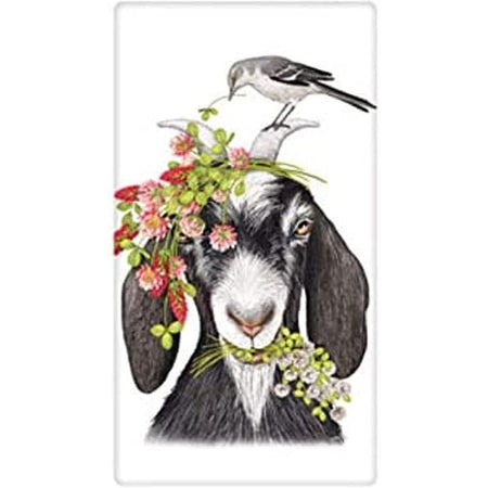 Black goat with a bird, clover & flowers on its head. 