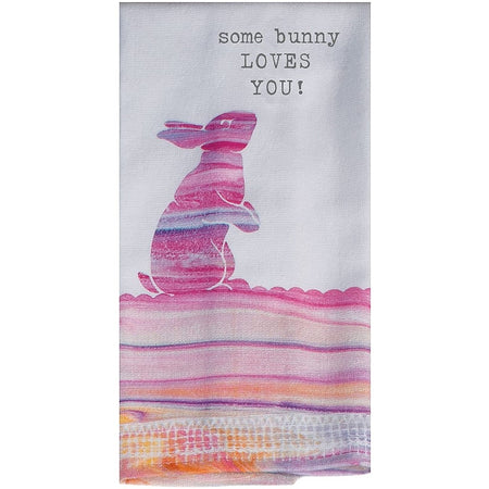 white terry cloth towel with pink and purple bunny rabbit and the words "some bunny loves you" printed on it.