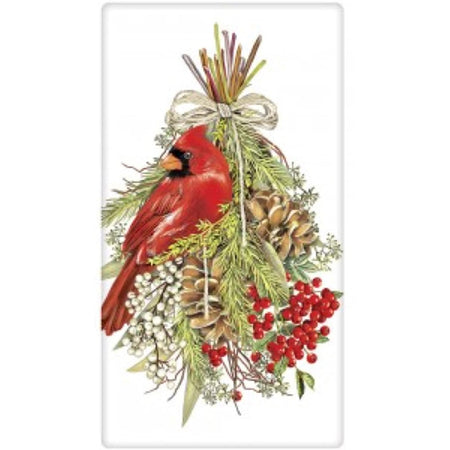 Red cardinal sitting in a pine swag.