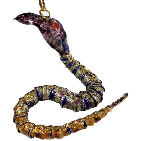 Copper snake painted violet, yellow, blue & green.