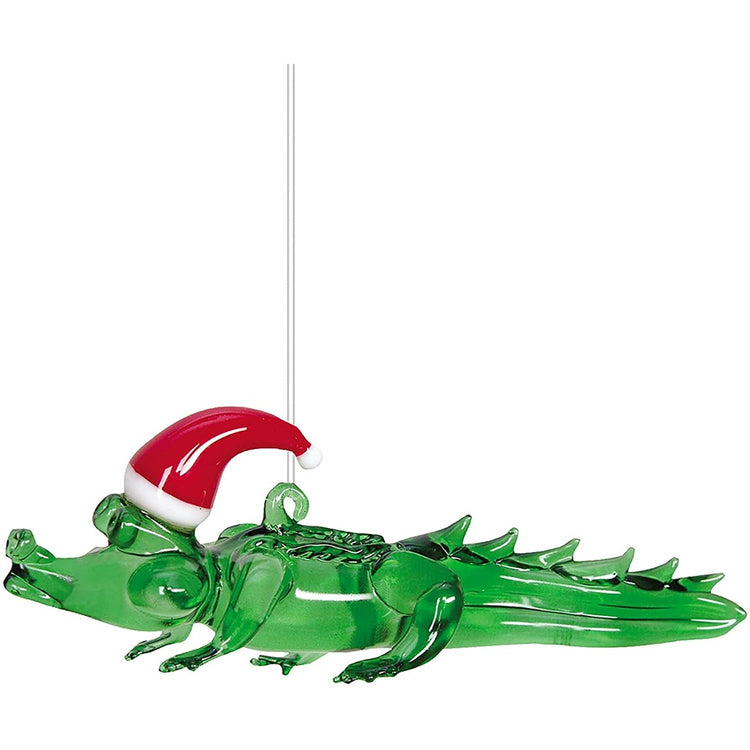 green alligator with a santa hat on