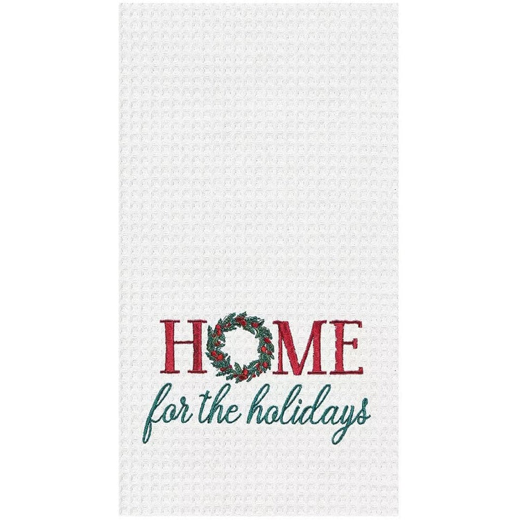 White waffle weave towel that says "Home for the holidays".