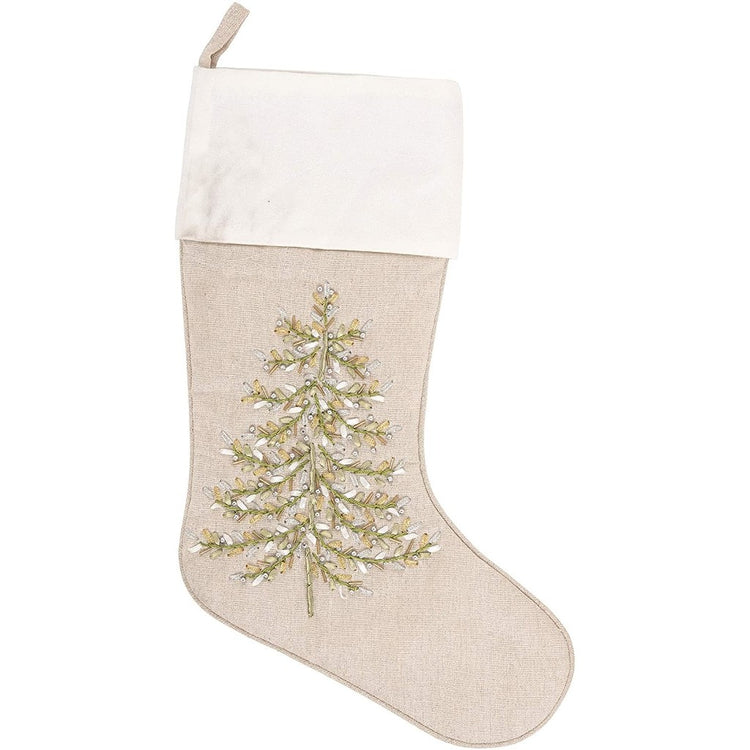 Tan fabric stocking, with white border at the top & a wintery pine tree made of green gold and white embroidered ribbon.