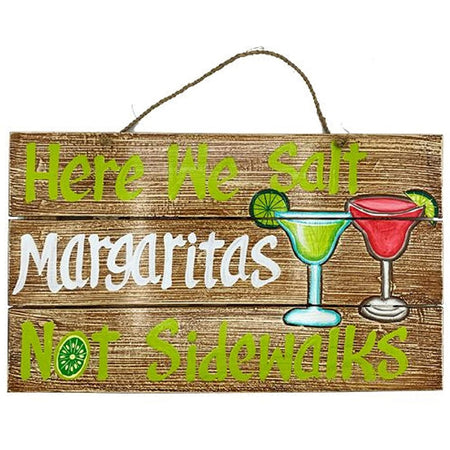 Wood slat sign that says "here we salt margaritas not sidewalks"