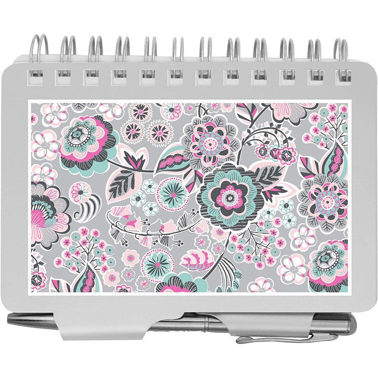 Spiral memo pad with attached pen.  Floral bloom design.