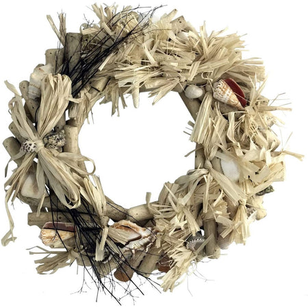 Driftwood wreath that has shells all around its diameter.
