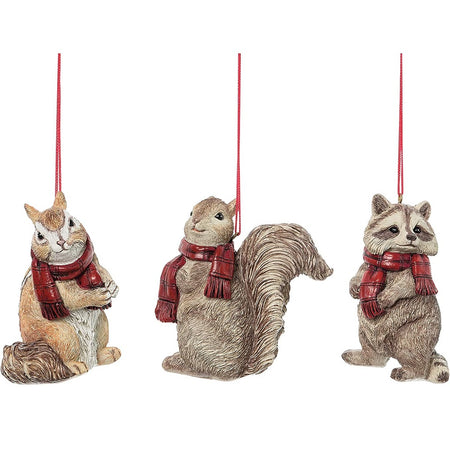 three hanging ornments; a squirrel, a chipmunk and a racoon, each wearing a scarf with a red string hanger on each.
