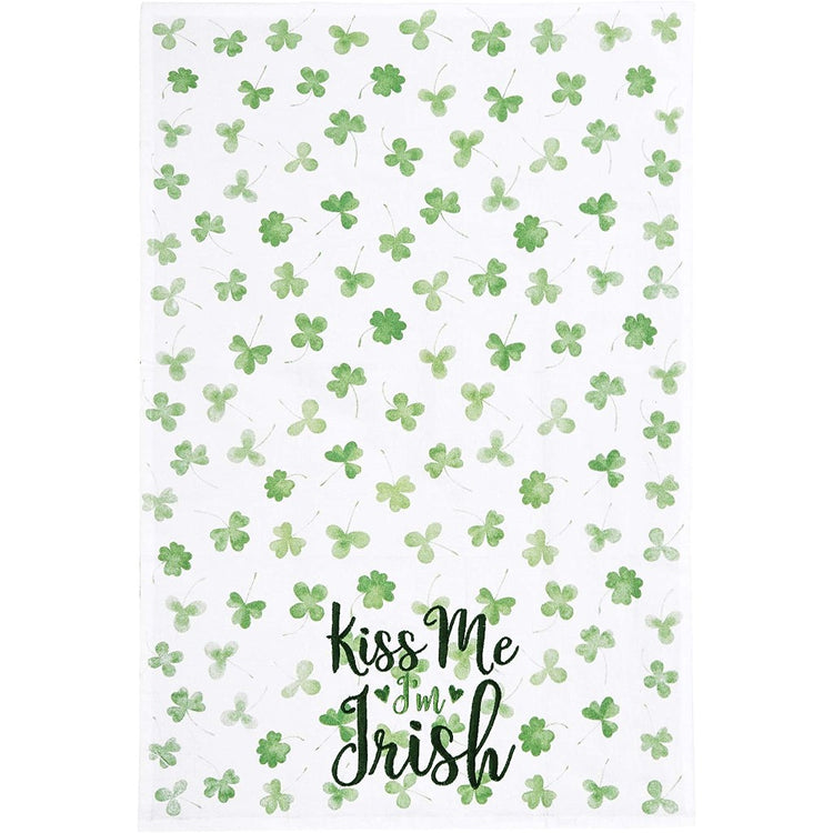 White towel with green clovers & it says Kiss Me I'm Irish.