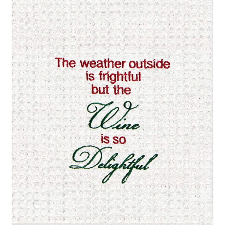 White waffle wave dish towel embroidered text "The weather outside is frightful but the Wine is so Delightfull.
