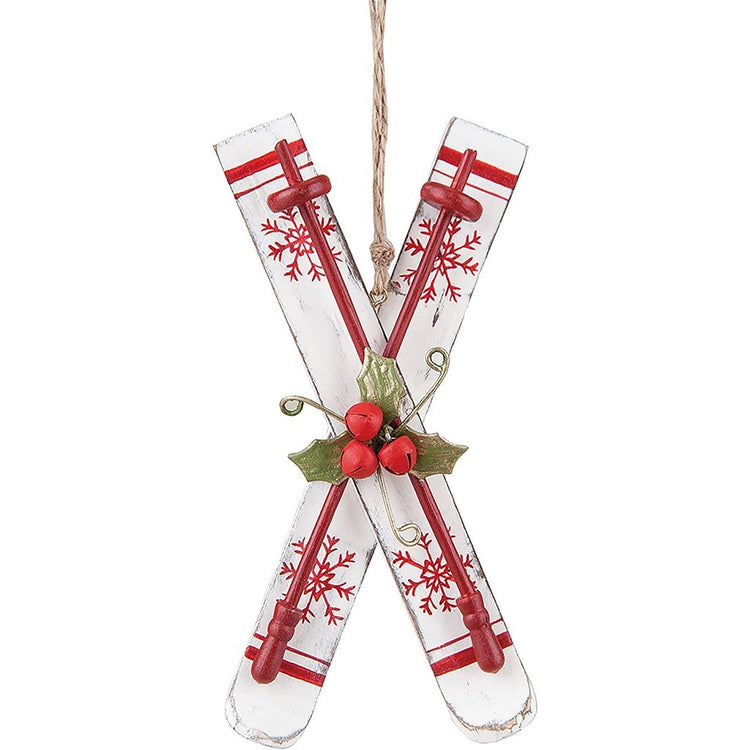 White skiis with red snowflake accents.
