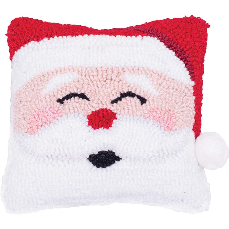 Santa face smiling on a pillow.