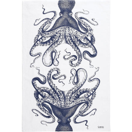 White flour sack towel with blue octopus printed in a mirror image on the towel.