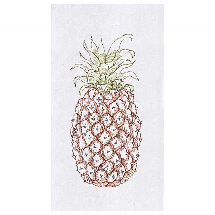 White kitchen towel. Brown textured pineapple with green leaves on the top.