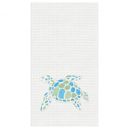 White towel with swimming sea turtle spotted in blue & green,