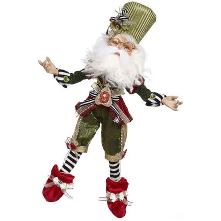 tall bearded elf in green hat, shirt and shorts, red shoes and vest, and black and white striped stockings.