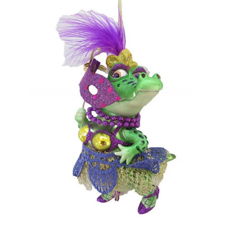 Female crocodile figure ornament wearing green & purple with mask.