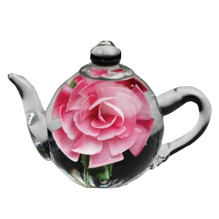 Clear teapot figurine with rose decoration encased within.