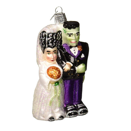 Blown Glass ornament of Frankenstein and his bride, with glitter accents