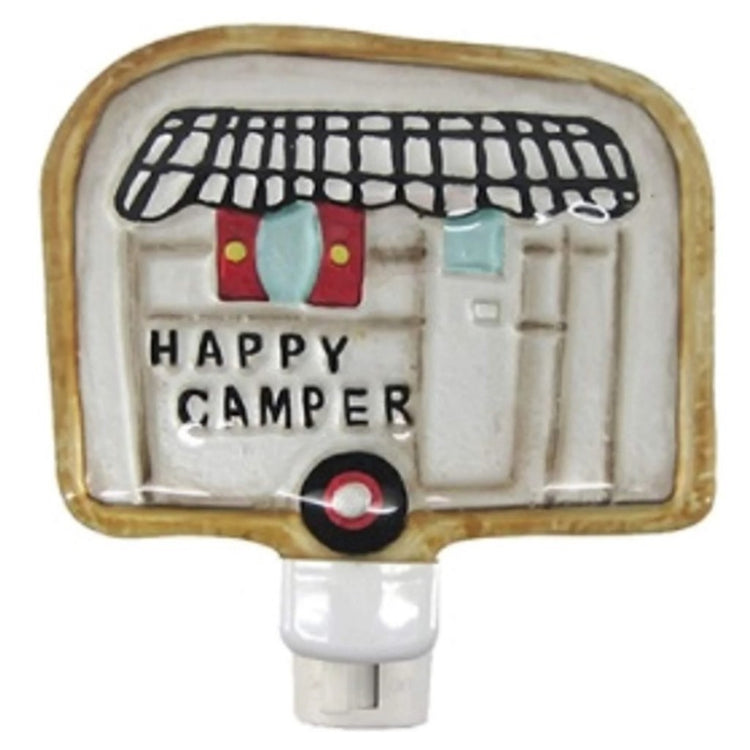 Grey camper shaped night light that says "happy camper".