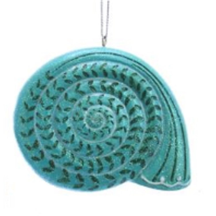 Teal scallop shell ornament with black accents. String hanger at top.