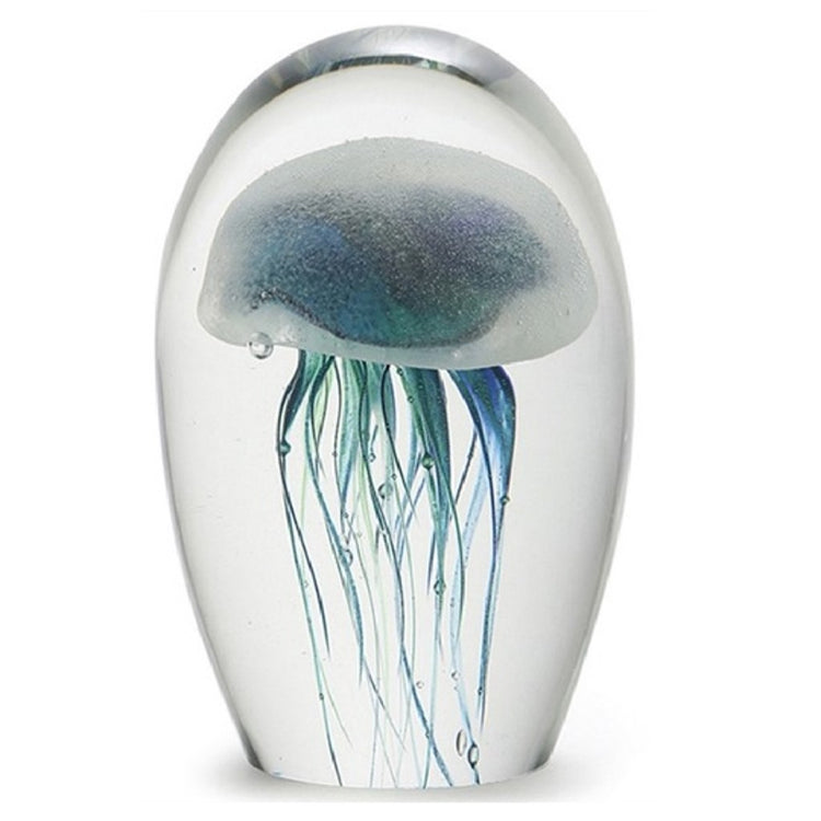 blown glass paperweight with glow in the dark teal jellyfish design.