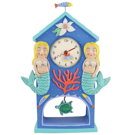 Mantle clock with 2 blonde mermaids, and a green turtle swinging pendulum.