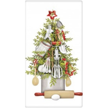 White kitchen towel imprinted with an evergreen tree in pot with rolling pen and egg in front.  Tree is decorated with kitchen utensils. . 