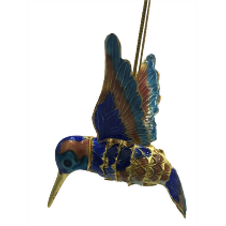 dark blue and light blue humming bird with orange accents