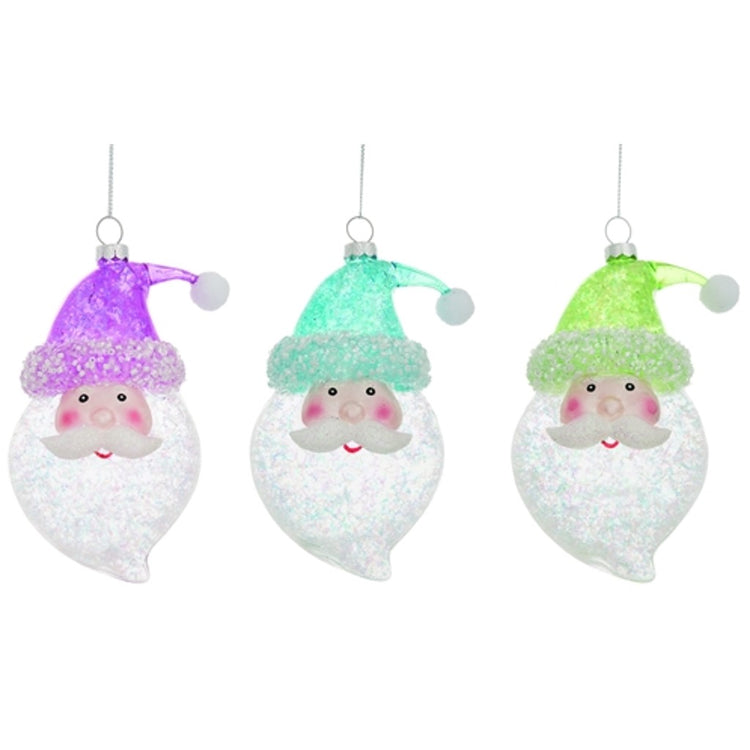 3 blown glass santa head ornaments 1 has a purple hat, 1 is green, and 1 is blue.