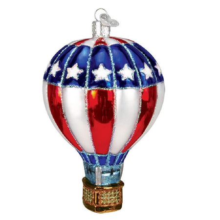 Blown glass ornament shaped like a hot air balloon, with red and white stripes, and a blue ring around the top with white stars.