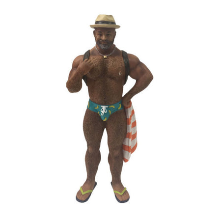 African American Burly man in bathing suit and flip flops figurine ornament.  Holds a towel and wears a backpack and hat