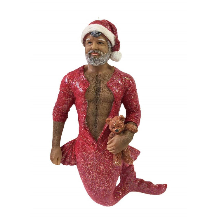 Older merman figurine ornament. Wearing a one piece red outfit unzipped in front.  Santa hat and teddybear.