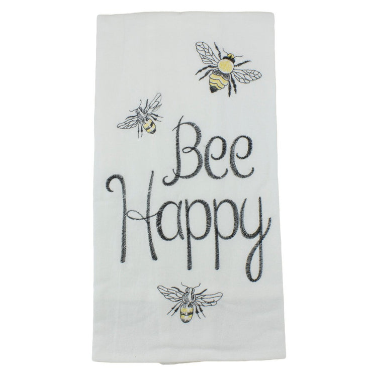 White folded flour sack dishtowel with black embroidered text "Bee Happy" and 3 bumble bees.