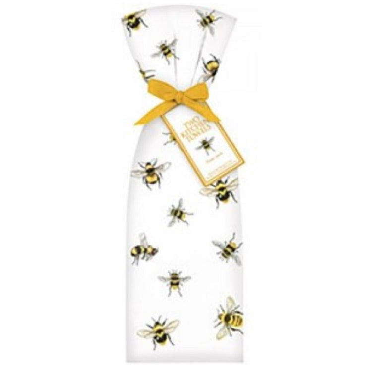 2 white towels tied with a yellow ribbon. Towel shows yellow and black bees of different sizes.