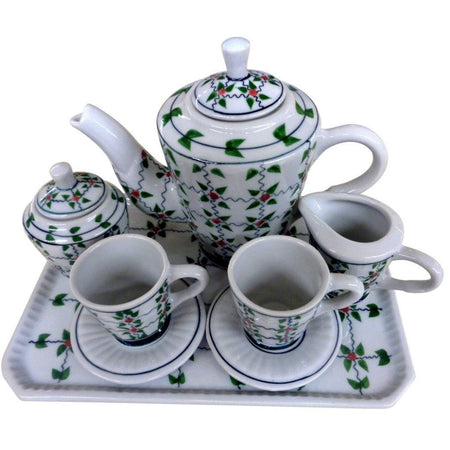 Tea set for 2 on tray.  Red and green berry fine accent on tray, teapot, creamer, sugar, 2 cups and saucers.