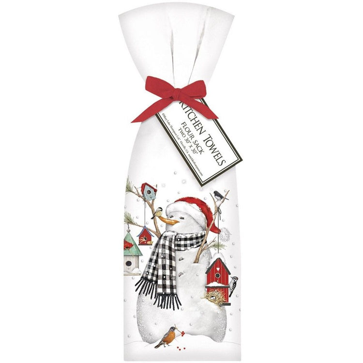 White flour sack kitchen towels tied with red ribbon imprinted with snowman holding birdhouses.