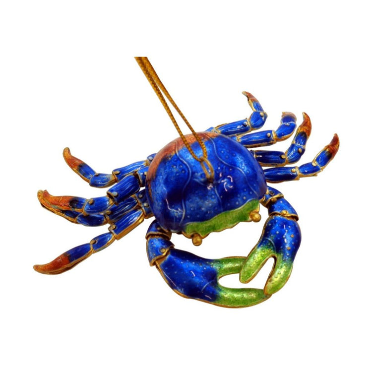 Blue crab shaped hanging Christmas ornament on gold cord.