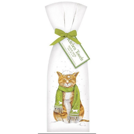 2 white towels tied with a green ribbon. Towel shows an orange cat wearing a green scarf with snow falling around it.