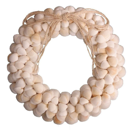 Round shell wreath with cockle shells. Flat back with twine bow.