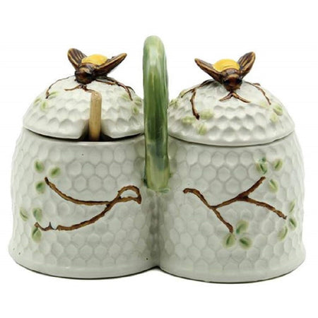 double condiment jar attached with bumble bee tops and green handle.