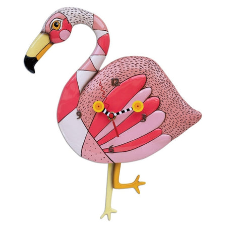 Flamingo shaped wall clock. Shades of pink with legs as pendulum, one knew bent.