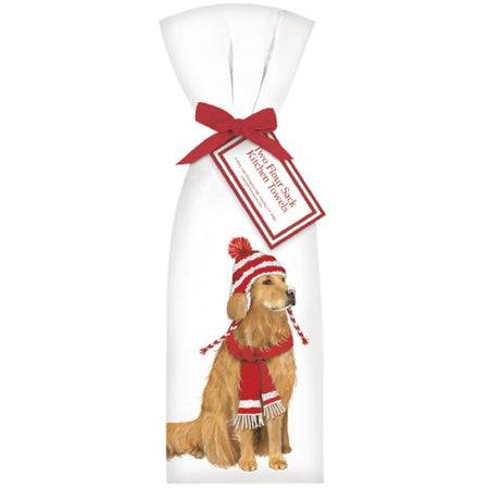2 white towels tied with a red ribbon. Towel shows a golden retriever  in a red and white winter hat and a red scarf.